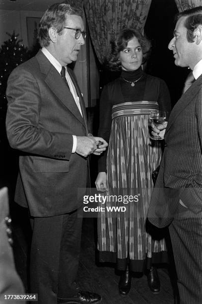 John Chancellor, Mary Chancellor, and John Schmuacher attend a party, celebrating the release of Charlotte Curtis' book "The Rich and Other...