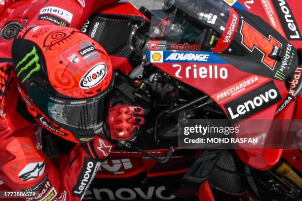 Ducati Lenovo Team's Italian rider Francesco Bagnaia takes a corner during the first practice session of the MotoGP Malaysian Grand Prix at the...