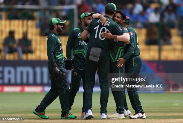 Hassan Ali of Pakistan celebrates the wicket of Devon Conway of New Zealand during the ICC Men's Cricket World Cup India 2023 between New Zealand and...