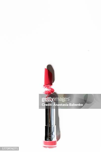 red accent on white backgrounds - red lipstick stick stock pictures, royalty-free photos & images