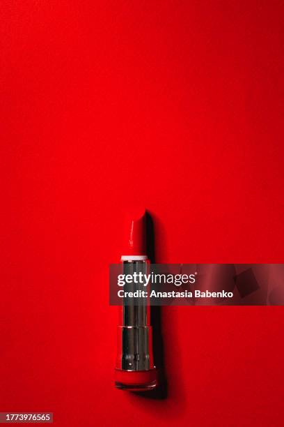intense red accent - red lipstick stick stock pictures, royalty-free photos & images
