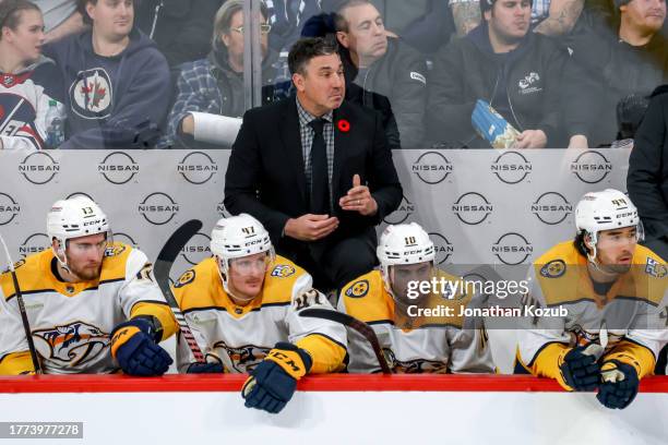 Head Coach Andrew Brunette of the Nashville Predators looks on from the bench during third period action against the Winnipeg Jets at the Canada Life...