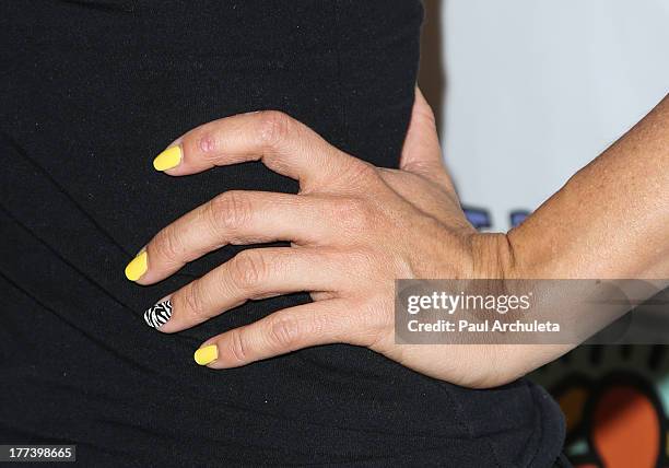 Actress Danica McKellar attends the Best Buddies celebrity poker charity event at Audi Beverly Hills on August 22, 2013 in Beverly Hills, California.