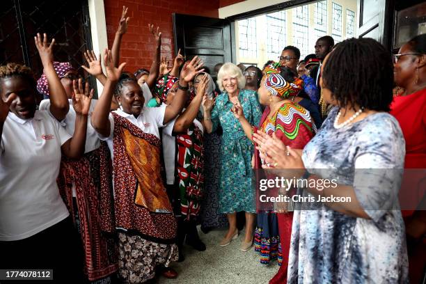 Queen Camilla dances with volunteers and staff from Sauti Ya Wanawake at the Situation Room on November 03, 2023 in Mombasa, Kenya. The Situation...