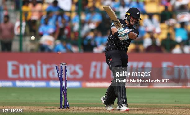 Mark Chapman of New Zealand is bowled by Mohammed Wasim of Pakistan during the ICC Men's Cricket World Cup India 2023 between New Zealand and...
