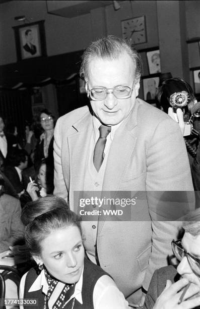 Trish Van Devere and George C. Scott attend an awards ceremony at Sardi's in New York City on January 30, 1977.