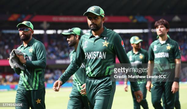 Babar Azam of Pakistan makes their way off after fielding during the ICC Men's Cricket World Cup India 2023 between New Zealand and Pakistan at M....