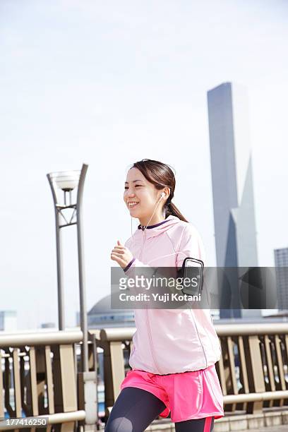 the woman who is running - woman jogging ストックフォトと画像