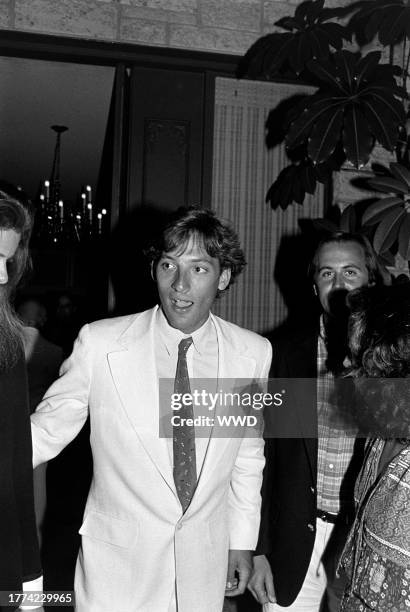 Anthony Peck attends a party at the Lazar residence in Los Angeles, California, on August 26, 1981.