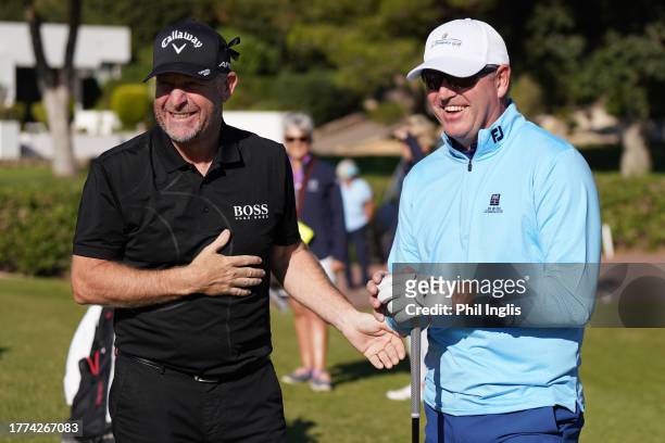 Gary Evans of England has a chat with amateur partner Nigel Williams during Day Two of the Farmfoods European Senior Masters hosted by Peter Baker...