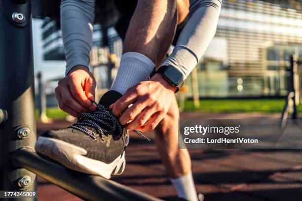 get laced up and get going - atar cordão de sapato imagens e fotografias de stock