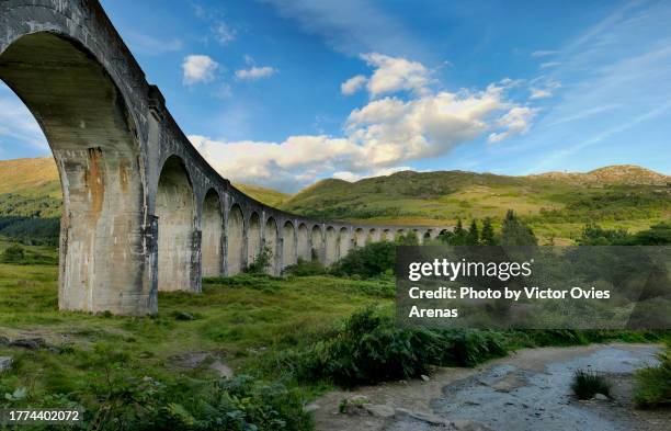 lower view of the glenfinnan railway viaduct on the west highland line in the west scottish highlands - glenfinnan stock pictures, royalty-free photos & images