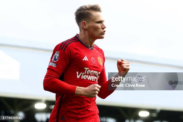 Scott McTominay of Manchester United celebrates after scoring a goal that is later ruled offside during the Premier League match between Fulham FC...