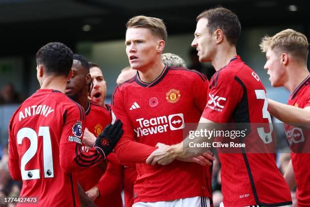 Scott McTominay of Manchester United reacts with teammates after his goal is ruled offside during the Premier League match between Fulham FC and...