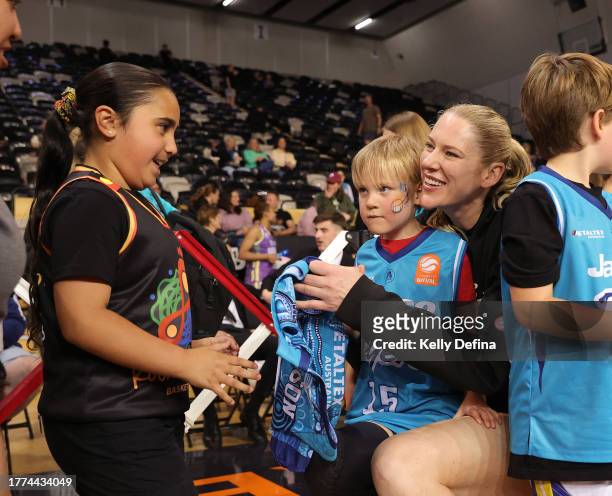 Lauren Jackson of the Flyers signs autographs for young players during the round one WNBL match between Southside Flyers and Melbourne Boomers at...