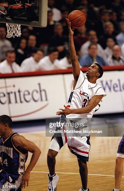 Guard Richard Hamilton of the University of Connecticut Huskies in action during the Great Eight Classic against the Washington Huskies on December...