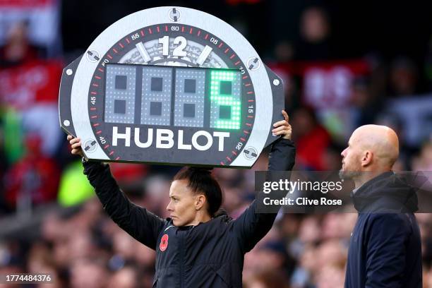 Fourth official, Rebecca Welch holds up the HUBLOT board indicating 5 minutes of added time to the first half during the Premier League match between...