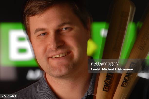 Portrait of Dave Cummings, founder of BATS Global Markets, with baseball bats, January 22, 2007.