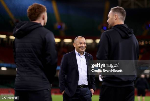 Eddie Jones, Coach of Barbarians, looks on as players of Barbarians inspect the pitch prior to the Test Match between Wales and Barbarians at...