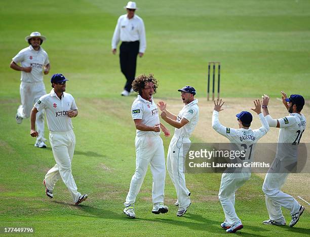 Ryan Sidebottom of Yorkshire celebrates the wicket of David Hussy of Nottinghamshire during day three of the LV County Championship division one...