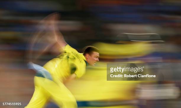 Josh Hazlewood of Australia in bowling action during the ICC Men's Cricket World Cup India 2023 between England and Australia at Narendra Modi...