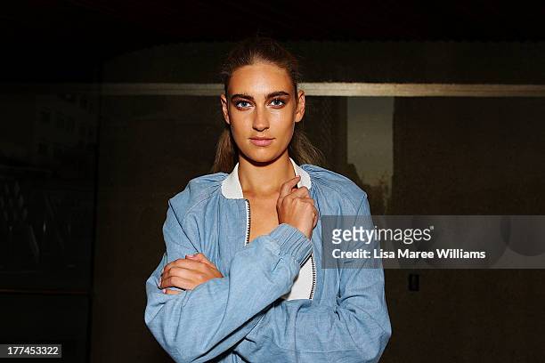 Model Amelia poses backstage ahead of the MBFWA Trends show during Mercedes-Benz Fashion Festival Sydney 2013 at Sydney Town Hall on August 23, 2013...