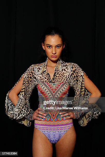 Model poses backstage ahead of the MBFWA Trends show during Mercedes-Benz Fashion Festival Sydney 2013 at Sydney Town Hall on August 23, 2013 in...