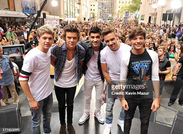 Niall Horan, Harry Styles, Zayn Malik, Liam Payne and Louis Tomlinson of One Direction perform on NBC's "Today" at Rockefeller Center on August 23,...