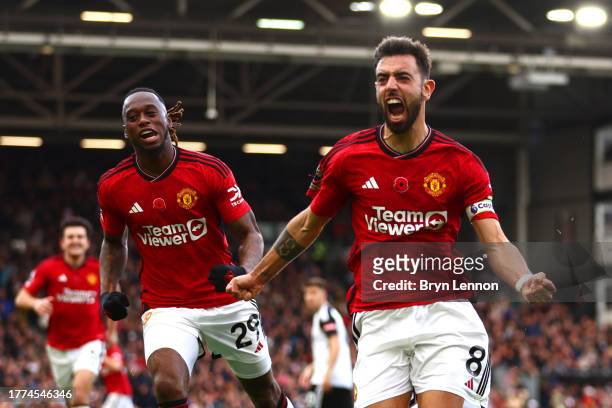 Bruno Fernandes of Manchester United celebrates after scoring the team's first goal during the Premier League match between Fulham FC and Manchester...