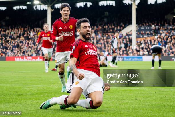 Bruno Fernandes of Manchester United celebrates after scoring their sides first goal during the Premier League match between Fulham FC and Manchester...