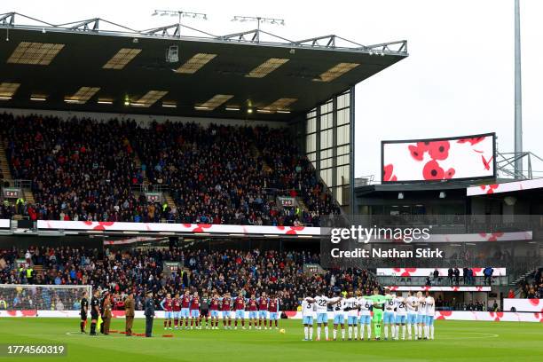 The fans, players and match officials observe a minutes silence ahead of the upcoming Armistice Day prior to kick-off ahead of the Premier League...