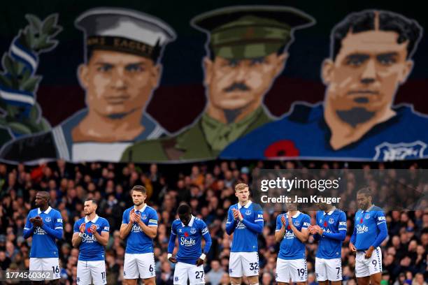 Everton players applaud after the minutes silence for the upcoming Armistice Day prior to the Premier League match between Everton FC and Brighton &...
