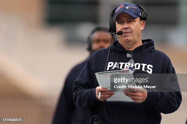 New England Patriots offensive coordinator Bill O'Brien looks on during the game against the Buffalo Bills at Gillette Stadium on October 22, 2023 in...
