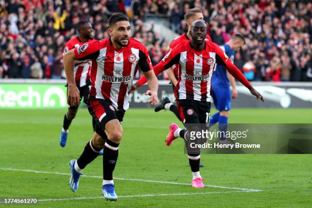 Neal Maupay of Brentford celebrates after scoring the team's first goal during the Premier League match between Brentford FC and West Ham United at...