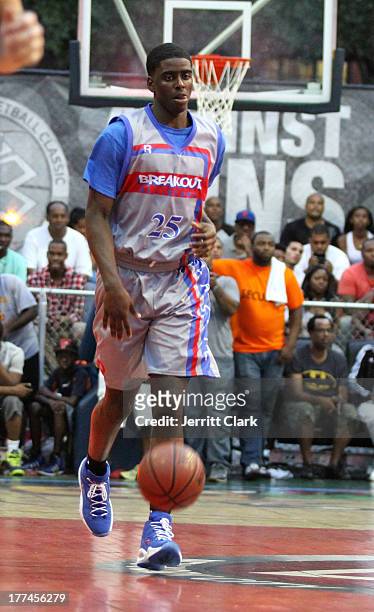 Dwayne Bacon plays for Reebok Classic Breakout Allstars at EBC's "The Finale" Tournament at Rucker Park on August 22, 2013 in New York City.