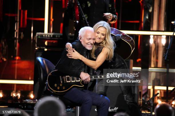 Peter Frampton and Sheryl Crow perform onstage at the 38th Annual Rock & Roll Hall Of Fame Induction Ceremony at Barclays Center on November 03, 2023...