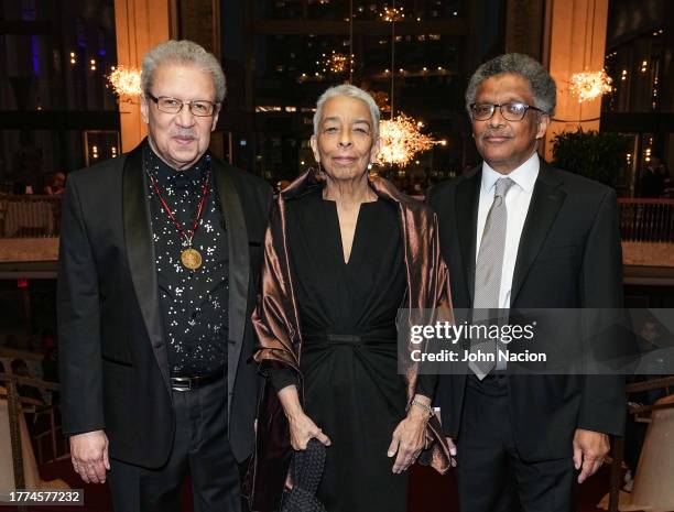 Anthony Davis, Thulani Davis and Christopher Davis attend the "X: The Life and Times Of Malcolm X" opening night at The Metropolitan Opera on...