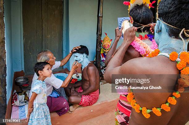 Face painting at Gajan festival. Gajan is a Hindu festival celebrated mostly in the Indian state of West Bengal.