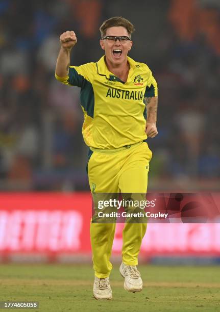 Adam Zampa of Australia celebrates the wicket of Moeen Ali of England during the ICC Men's Cricket World Cup India 2023 between England and Australia...