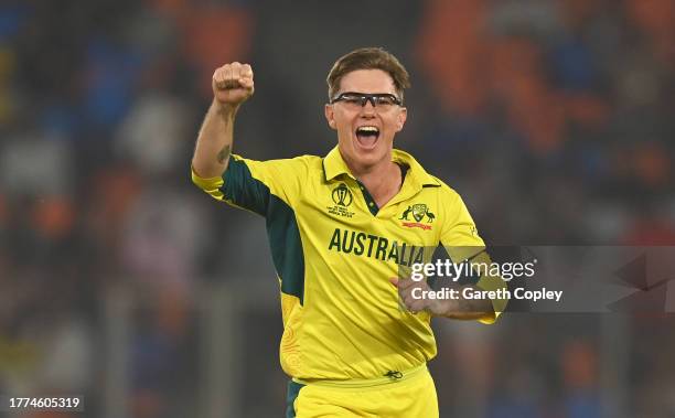 Adam Zampa of Australia celebrates the wicket of Moeen Ali of England during the ICC Men's Cricket World Cup India 2023 between England and Australia...