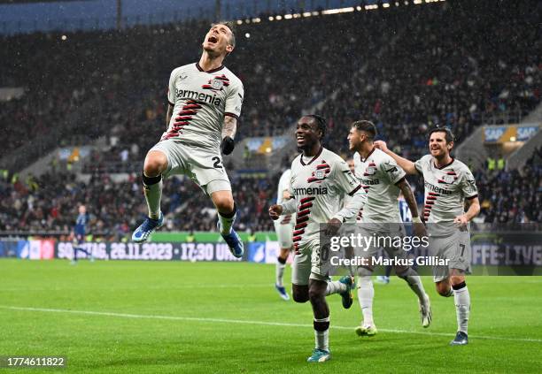 Alex Grimaldo of Bayer Leverkusen celebrates after scoring the team's third goal during the Bundesliga match between TSG Hoffenheim and Bayer 04...