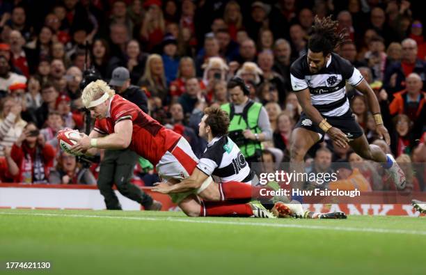 Aaron Wainright of Wales scores a try during the International match between Wales and Barbarians at Principality Stadium on November 04, 2023 in...