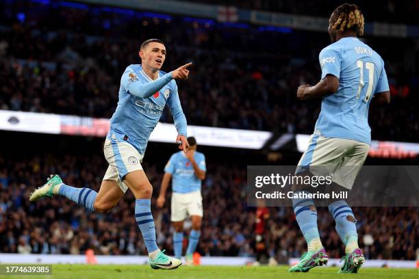 Phil Foden of Manchester City celebrates after scoring the team's fourth goal during the Premier League match between Manchester City and AFC...