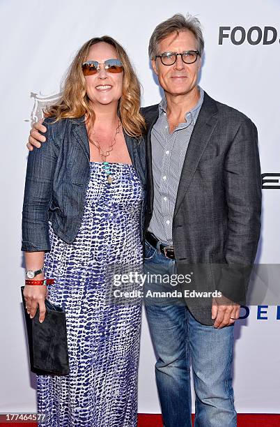 Actor Henry Czerny and his wife Claudine Cassidy arrive at the opening night of the 2013 Los Angeles Food & Wine Festival - "Festa Italiana With...