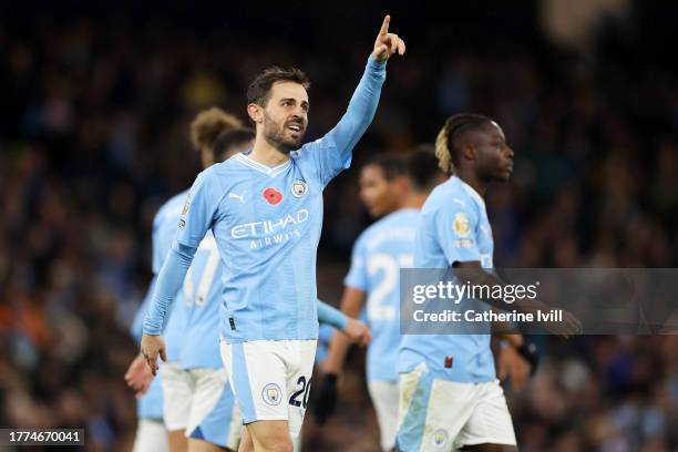 Bernardo Silva of Manchester City celebrates after scoring the team's fifth goal during the Premier League match between Manchester City and AFC...