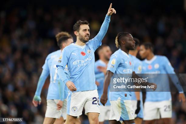 Bernardo Silva of Manchester City celebrates after scoring the team's fifth goal during the Premier League match between Manchester City and AFC...