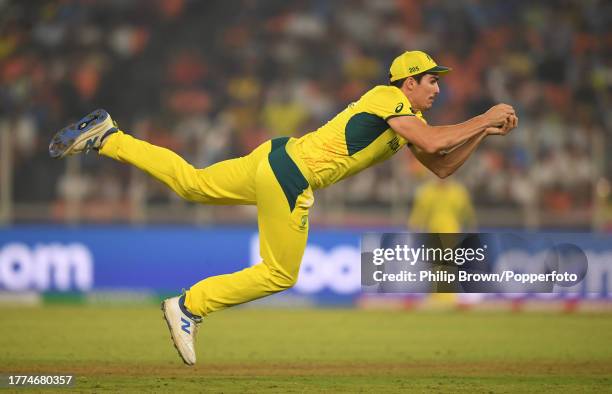 Sean Abbott of Australia catches Liam Livingstone of England during the ICC Men's Cricket World Cup India 2023 between England and Australia at...