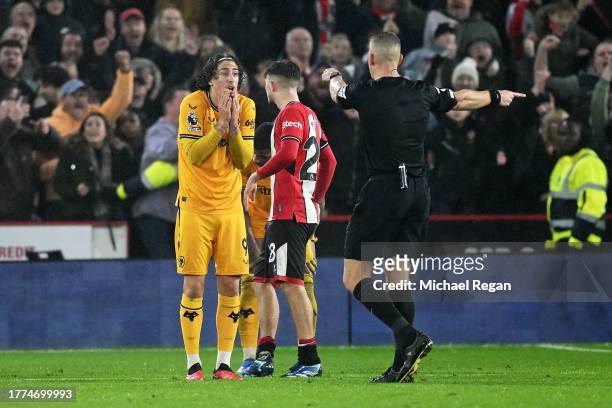 Referee, Robert Jones awards Sheffield United a last minute penalty during the Premier League match between Sheffield United and Wolverhampton...