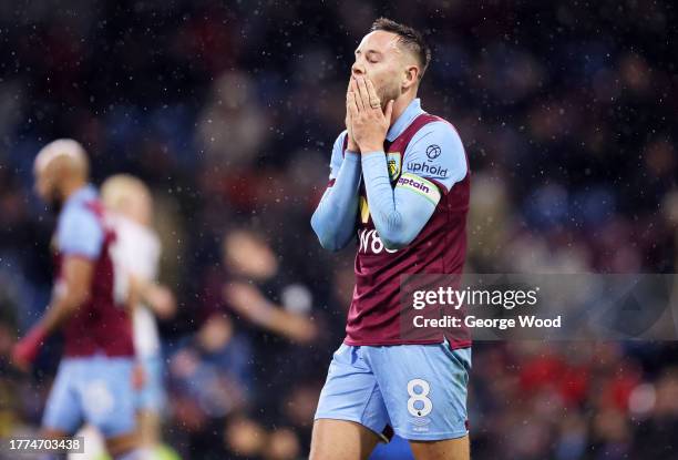 Josh Brownhill of Burnley reacts after Tyrick Mitchell of Crystal Palace scores the team's second goal during the Premier League match between...