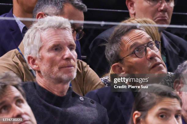 Denis Brogniart and Julien Courbet are seen at the Rolex Paris Masters - Day Six at Palais Omnisports de Bercy on November 05, 2023 in Paris, France.